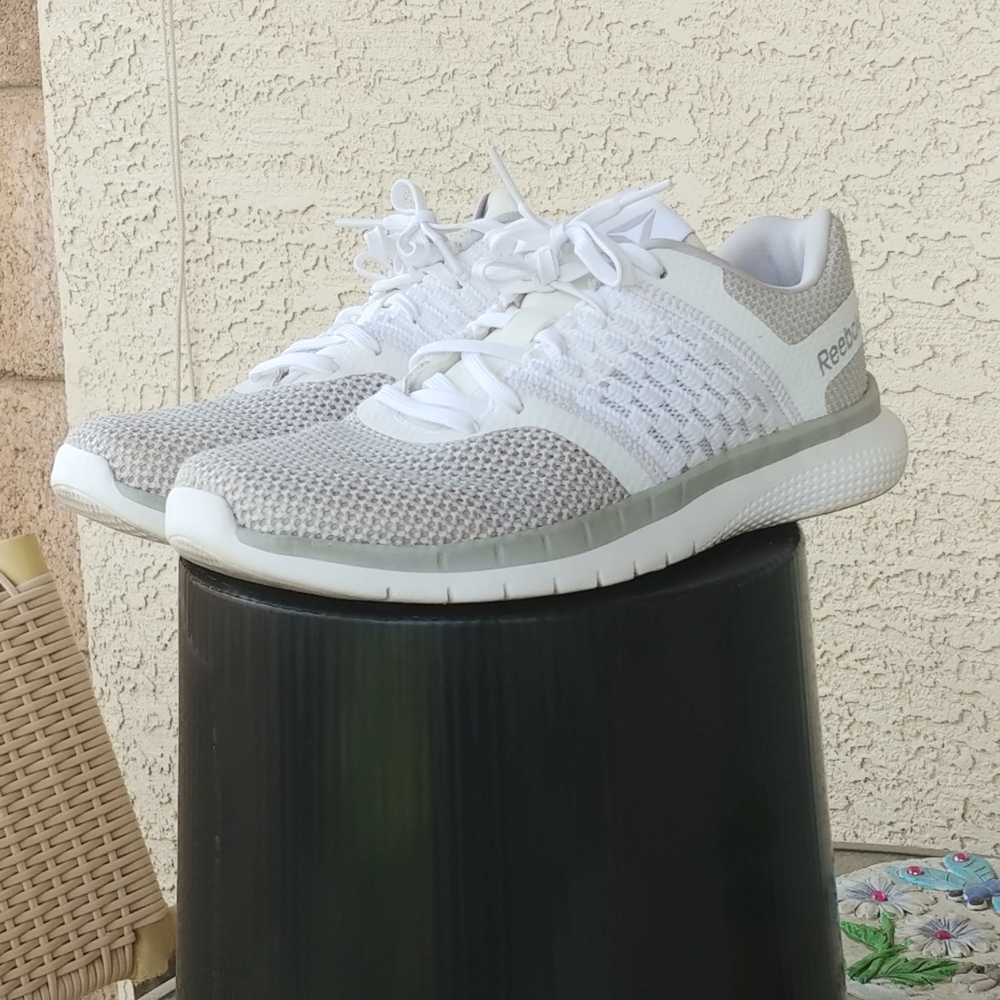Women's white Reebok street athletic shoes